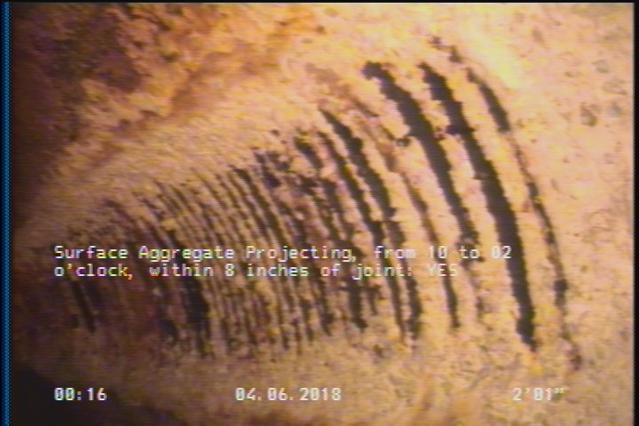 Surface Aggregate Projecting, from 10 to 02 o'clock, within 8 inches of joint: YES