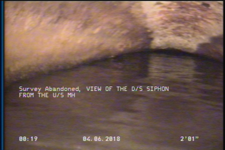 Survey Abandoned - VIEW OF THE D/S SIPHON FROM THE U/S MH