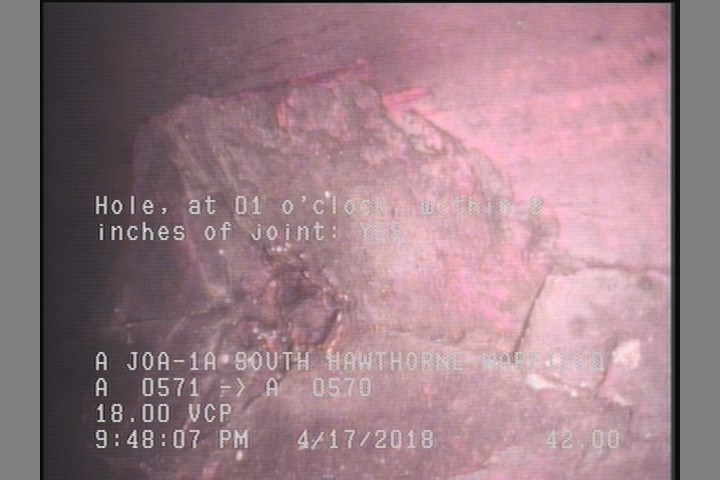 Hole, at 01 o'clock, within 8 inches of joint: YES