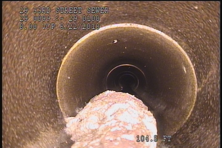 Deposits Settled Other, 20 %of cross sectional area, from 06 to 07 o'clock, , within 8 inches of joint: YES - DEBRIS