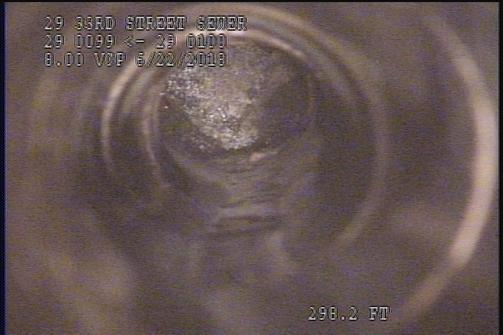 Upstream Manhole, Survey Ends - INSPECTION COMPLETE BY ZOOMING TO BEGINNING OF THE LINE