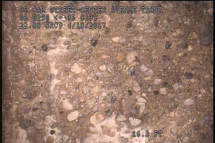 Surface Aggregate Projecting, from 08 to 04 o'clock, within 8 inches of joint: NO - SEVERE AGG