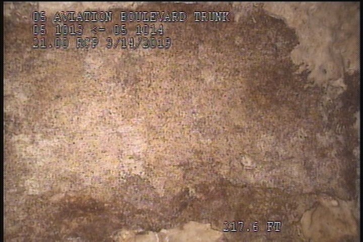 Surface Spalling, from 10 to 02 o'clock, within 8 inches of joint: NO - BLISTERING PEELING CONCRETE