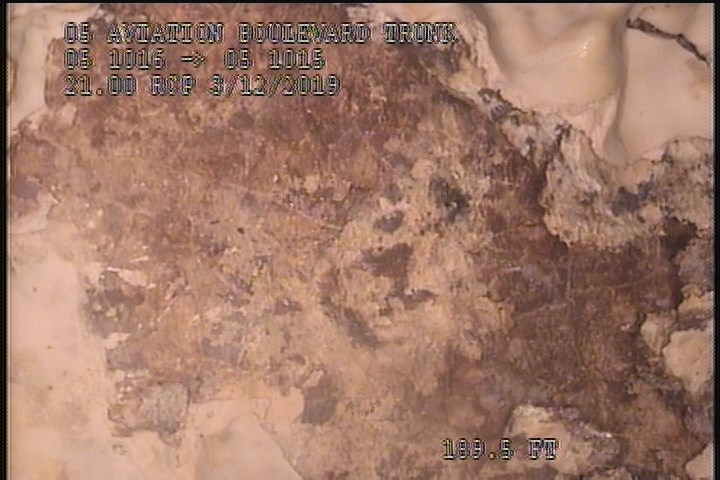 Surface Spalling, from 11 to 01 o'clock, within 8 inches of joint: NO - BLISTERING PEELING CONCRETE