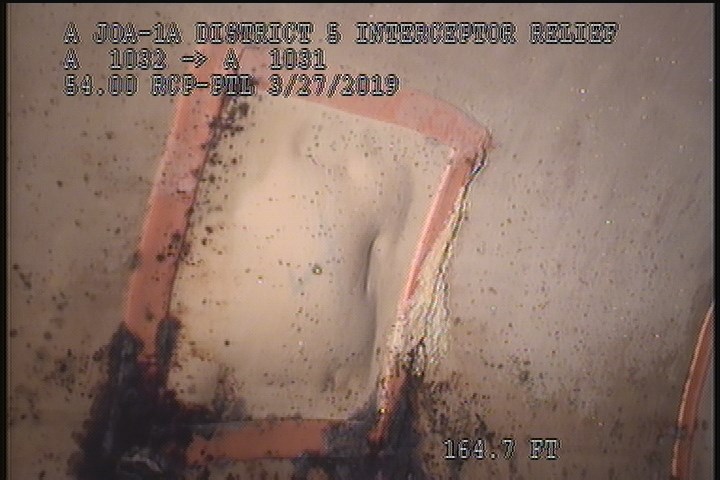Lining Failure Blistered, from 10 to 11 o'clock, within 8 inches of joint: YES - BLISTERED PATCH AREA