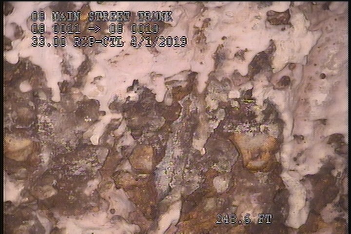 Surface Reinforcement Corroded, from 08 to 04 o'clock, within 8 inches of joint: NO - CIRCUM REBAR
