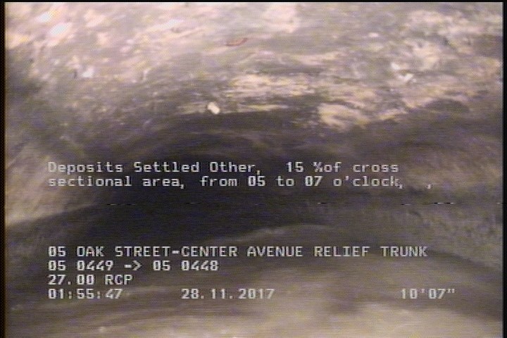 Deposits Settled Other, 15 %of cross sectional area, from 05 to 07 o'clock, , within 8 inches of joint: NO - ROCKS