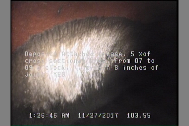 Deposits Attached Grease, 5 %of cross sectional area, from 07 to 09 o'clock, , within 8 inches of joint: YES