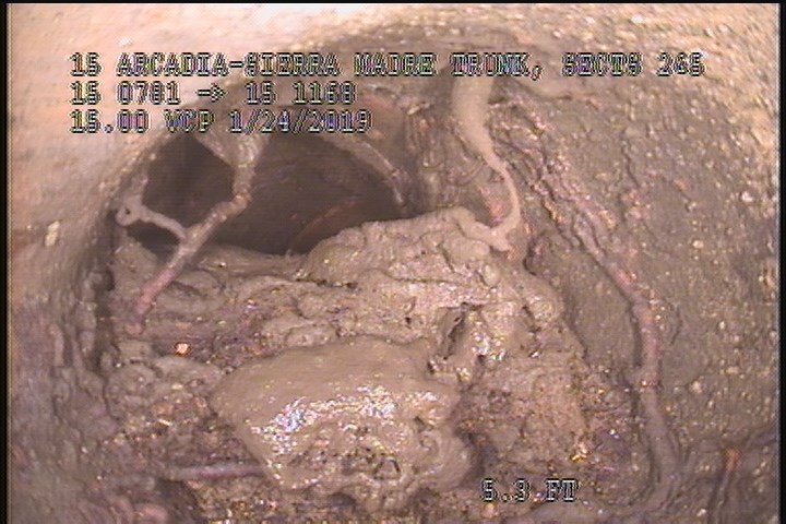Tap Factory Made Defective, at 10 o'clock, -, within 8 inches of joint: YES, 4" - Open/75% GREASE-LATERAL