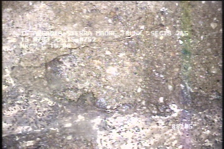 Surface Spalling, from 09 to 03 o'clock, within 8 inches of joint: NO - PEELING CONCRETE SEVERE AGG ATTACHED