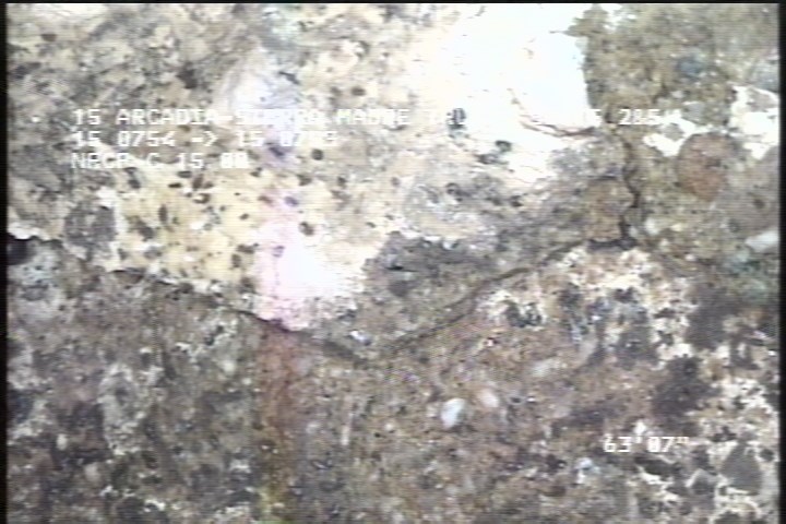 Surface Spalling, from 10 to 02 o'clock, within 8 inches of joint: NO - PEELING CONCRETE SEVERE AGG ATTACHED