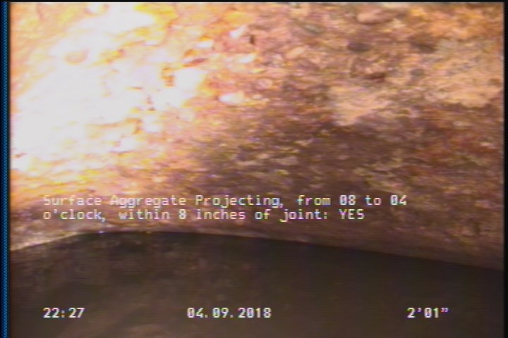 Surface Aggregate Projecting, from 08 to 04 o'clock, within 8 inches of joint: YES