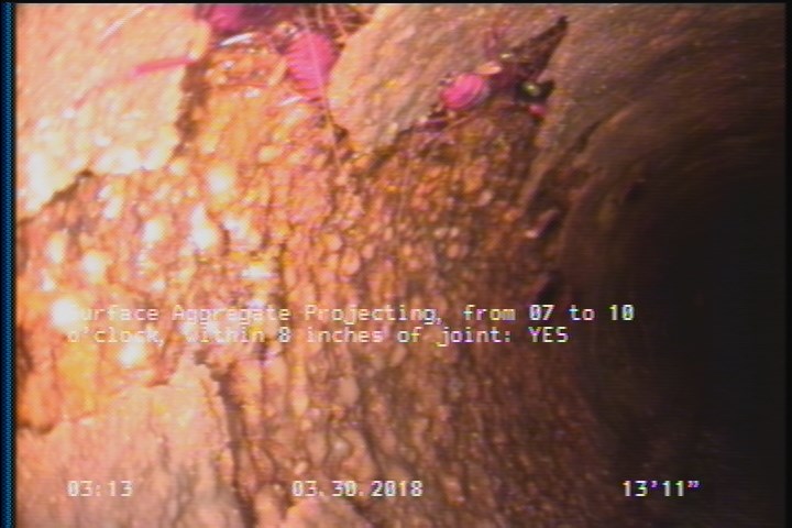 Surface Aggregate Projecting, from 07 to 10 o'clock, within 8 inches of joint: YES