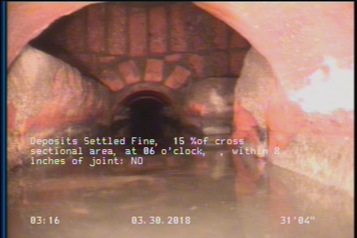 Deposits Settled Fine, 15 %of cross sectional area, at 06 o'clock, , within 8 inches of joint: NO