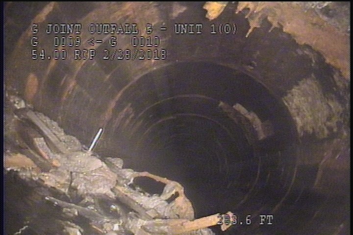 Deposits Settled Other, 15 %of cross sectional area, from 04 to 08 o'clock, , within 8 inches of joint: NO - DEBRIS