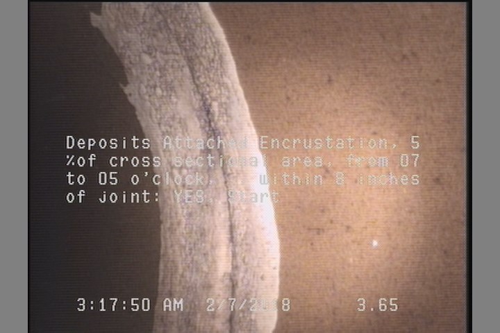 Deposits Attached Encrustation, 5 %of cross sectional area, from 07 to 05 o'clock, , within 8 inches of joint: YES, Start