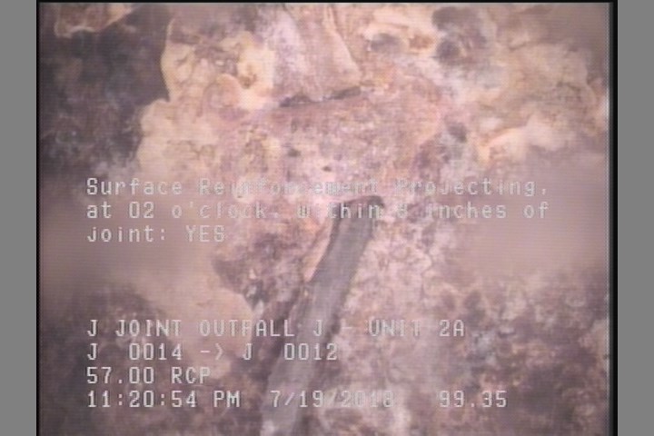 Surface Reinforcement Projecting, at 02 o'clock, within 8 inches of joint: YES