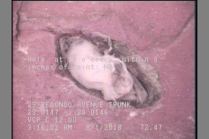 Hole, at 12 o'clock, within 8 inches of joint: NO