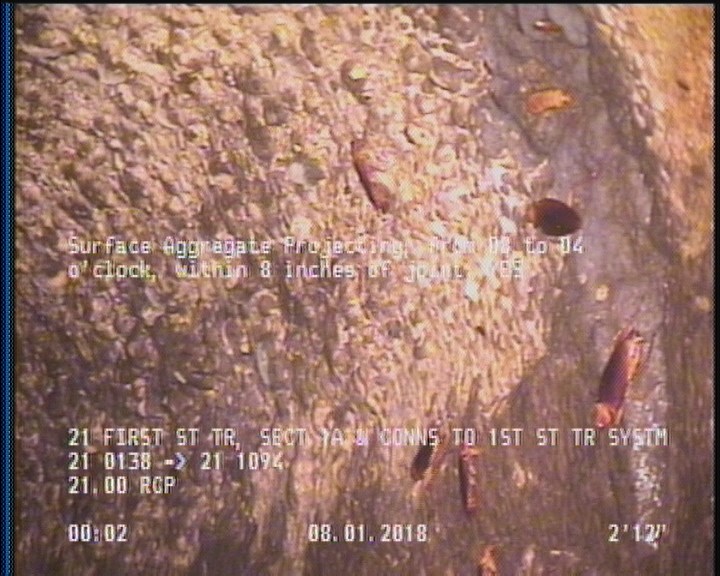 Surface Aggregate Projecting, from 08 to 04 o'clock, within 8 inches of joint: YES