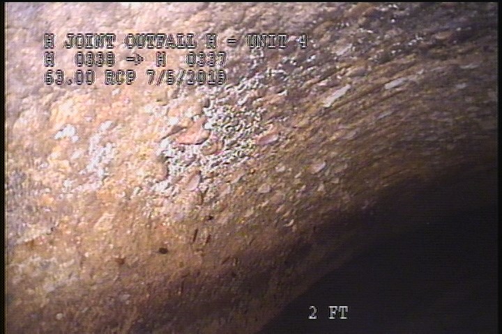 Surface Aggregate Projecting, from 10 to 02 o'clock, within 8 inches of joint: YES