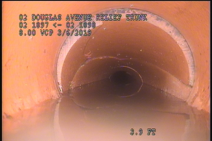 Downstream Manhole, Survey Begins - 10:02 AM