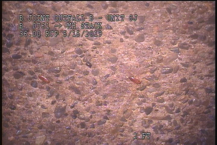 Surface Aggregate Projecting, from 08 to 04 o'clock, within 8 inches of joint: YES