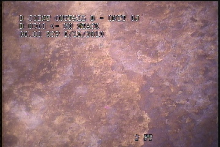 Downstream Manhole, Survey Begins - 9:49 AM