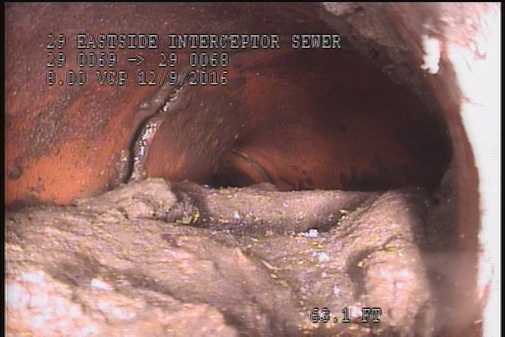 Tap Factory Made, at 02 o'clock, -, within 8 inches of joint: YES, 4" - 70% BLOCKED GREASE