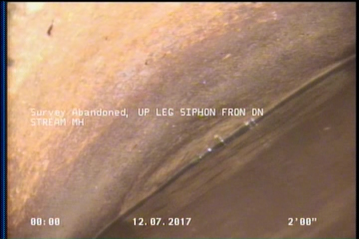 Survey Abandoned - UP LEG SIPHON FRON DN STREAM MH