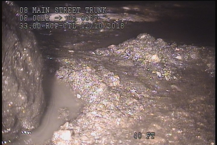 Deposits Settled Other, 20 %of cross sectional area, from 04 to 08 o'clock, , within 8 inches of joint: YES, Finish - MISSING TILES SLUDGE