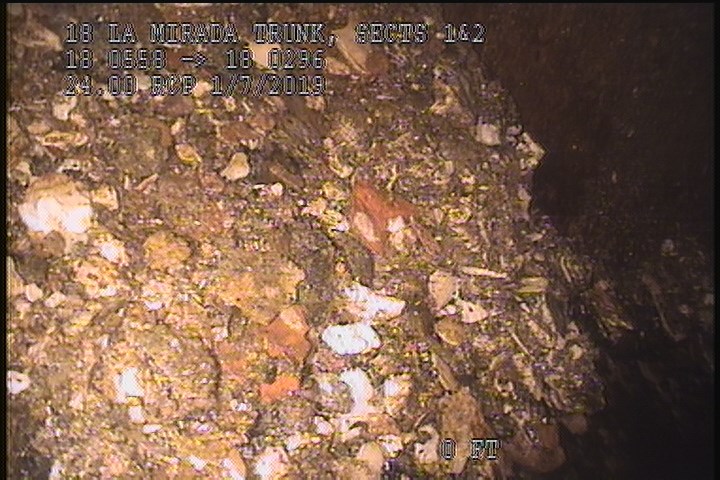 Deposits Settled Other, 10 %of cross sectional area, from 05 to 07 o'clock, , within 8 inches of joint: NO - PEELED CONCRETE