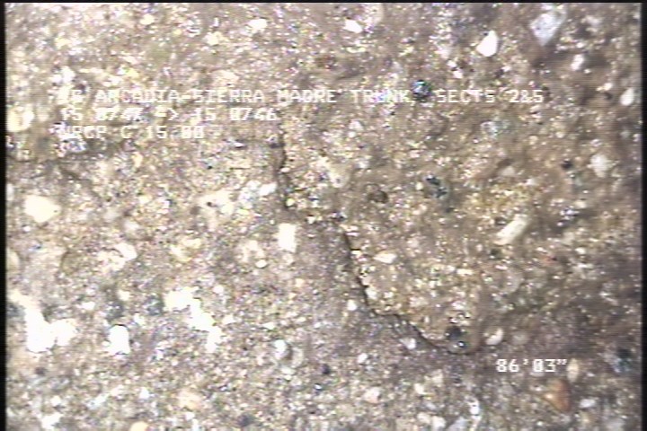 Surface Spalling, from 09 to 03 o'clock, within 8 inches of joint: NO - PEELING CONCRETE SEVERE AGG ATTACHED