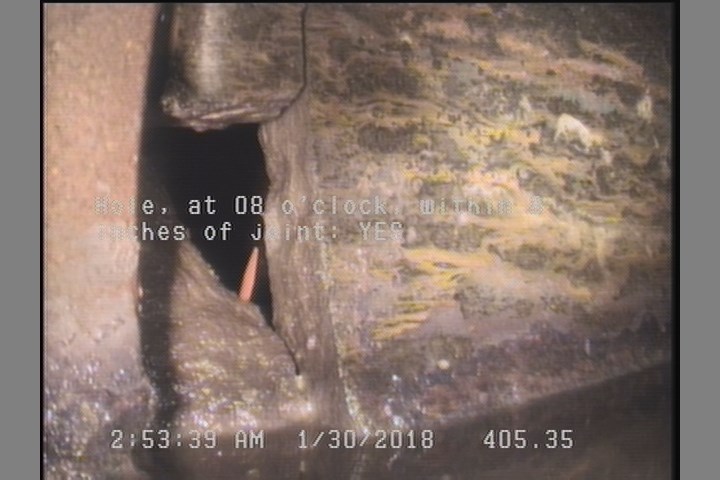 Hole, at 08 o'clock, within 8 inches of joint: YES
