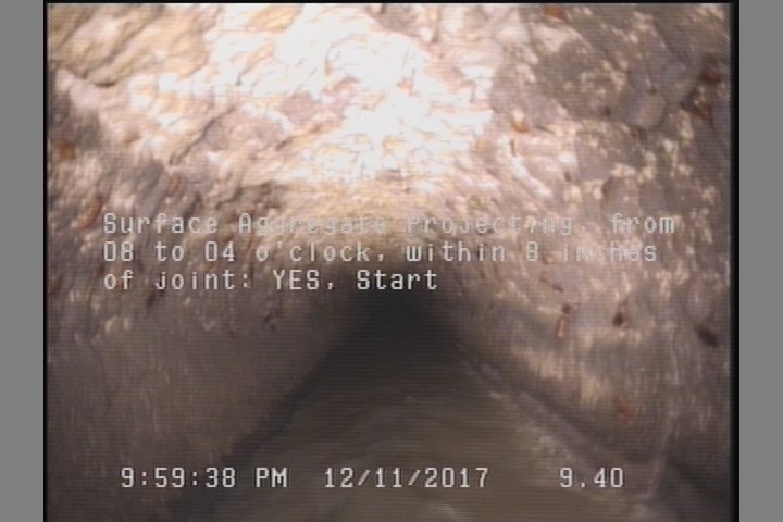 Surface Aggregate Projecting, from 08 to 04 o'clock, within 8 inches of joint: YES, Start