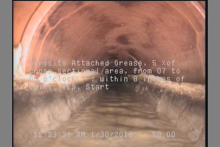 Deposits Attached Grease, 5 %of cross sectional area, from 03 to 09 o'clock, , within 8 inches of joint: YES, Start
