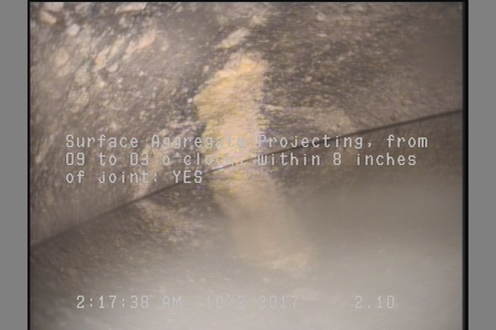 Surface Aggregate Projecting, from 09 to 03 o'clock, within 8 inches of joint: YES