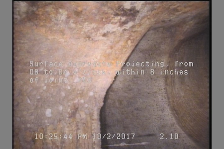 Surface Aggregate Projecting, from 08 to 04 o'clock, within 8 inches of joint: YES