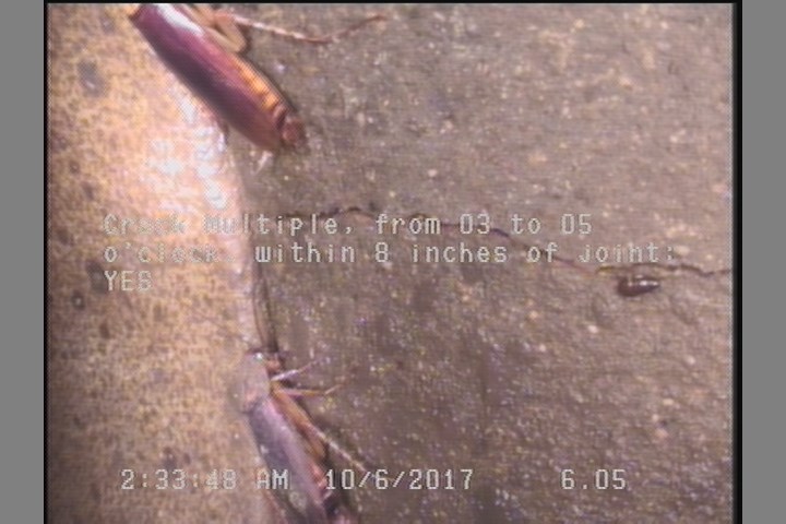 Crack Multiple, from 03 to 05 o'clock, within 8 inches of joint: YES