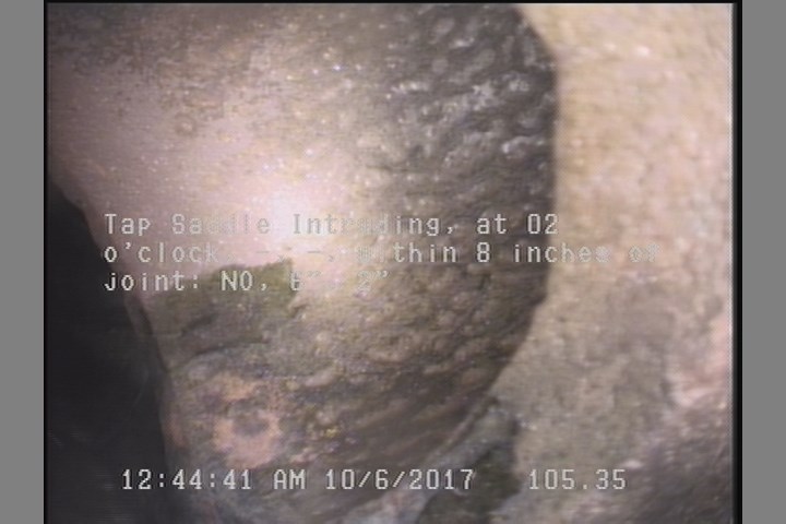 Tap Saddle Intruding, at 02 o'clock, -, -, within 8 inches of joint: NO, 6", 2"