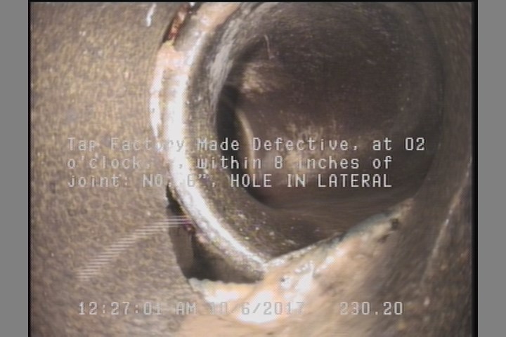 Tap Factory Made Defective, at 02 o'clock, -, within 8 inches of joint: NO, 6" - HOLE IN LATERAL