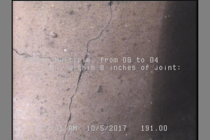 Crack Multiple, from 08 to 04 o'clock, within 8 inches of joint: YES
