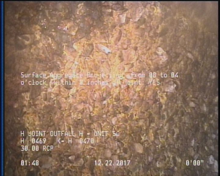 Surface Aggregate Projecting, from 08 to 04 o'clock, within 8 inches of joint: YES