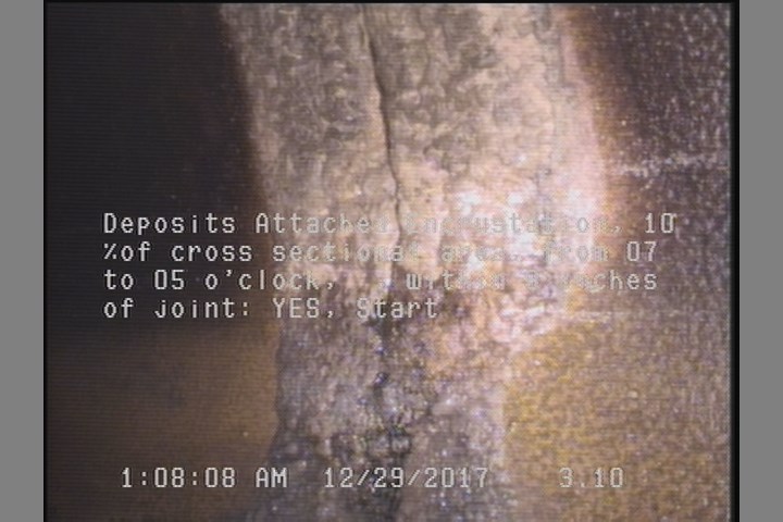 Deposits Attached Encrustation, 10 %of cross sectional area, from 07 to 05 o'clock, , within 8 inches of joint: YES, Start