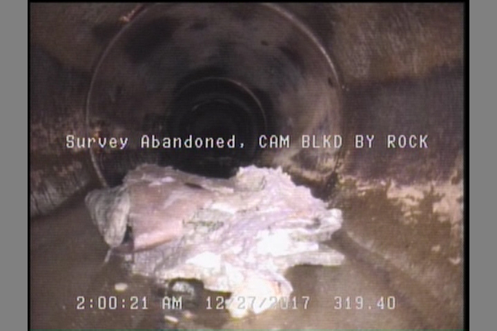 Survey Abandoned - CAM BLKD BY ROCK