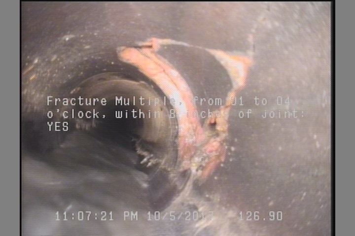 Broken, from 12 to 04 o'clock, within 8 inches of joint: YES - POSSIBLE SOIL VISIBLE