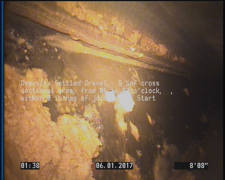 Deposits Settled Gravel, 5 %of cross sectional area, from 05 to 07 o'clock, , within 8 inches of joint: YES, Start
