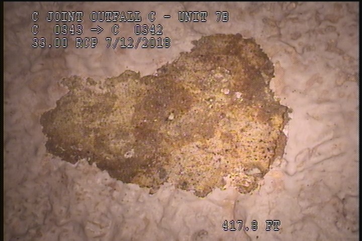 Surface Spalling, from 08 to 04 o'clock, within 8 inches of joint: NO - BLISTERING PEELING CONCRETE UNDER MAG COAT