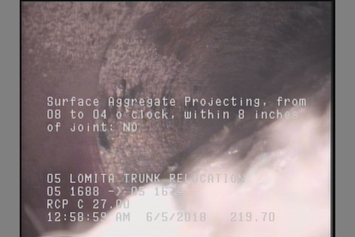 Surface Aggregate Projecting, from 08 to 04 o'clock, within 8 inches of joint: NO