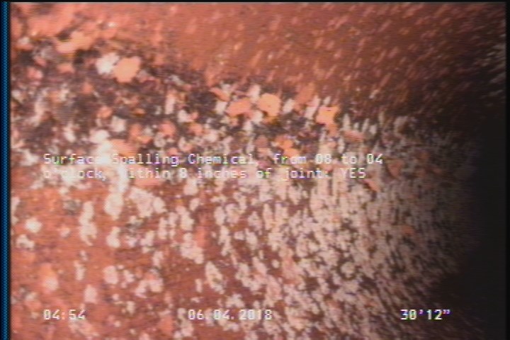 Surface Spalling Chemical, from 08 to 04 o'clock, within 8 inches of joint: YES