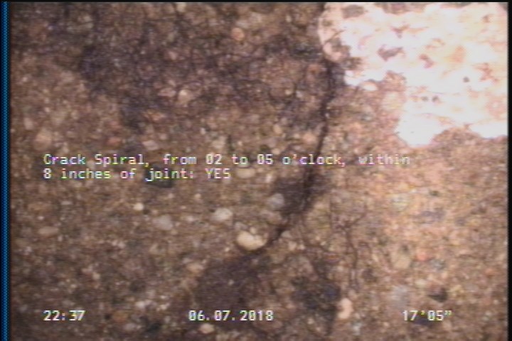 Crack Spiral, from 02 to 05 o'clock, within 8 inches of joint: YES
